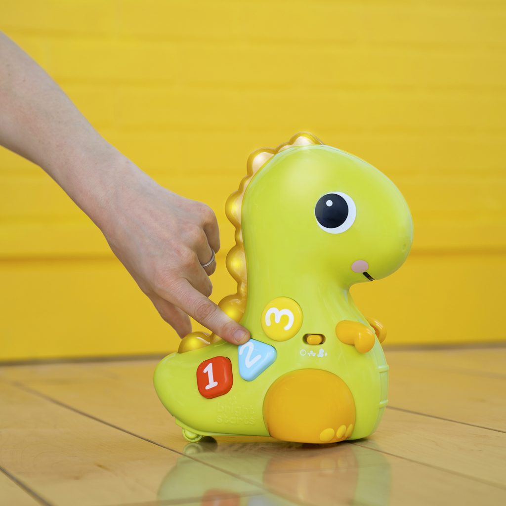 BRIGHT STARTS Hračka hudební světelná pohyblivá Dino, 6m+ – Obrázok 8